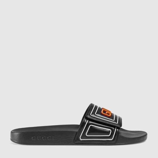 Gucci Men's Gucci logo leather slide sandal. 2 Gucci Men's Gucci logo leather slide sandal. 2