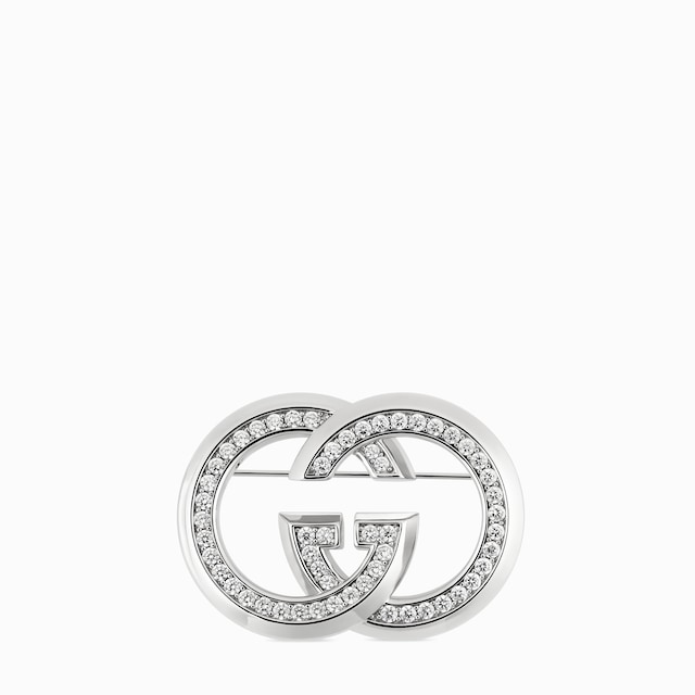 クリスタル付き インターロッキングG ブローチ