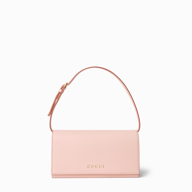 Mini pouch with Gucci lettering