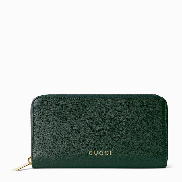 Cartera con cremallera y letras Gucci
