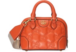 GG Matelassé mini top handle bag