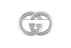 Broche avec détail GG enlacés et cristaux