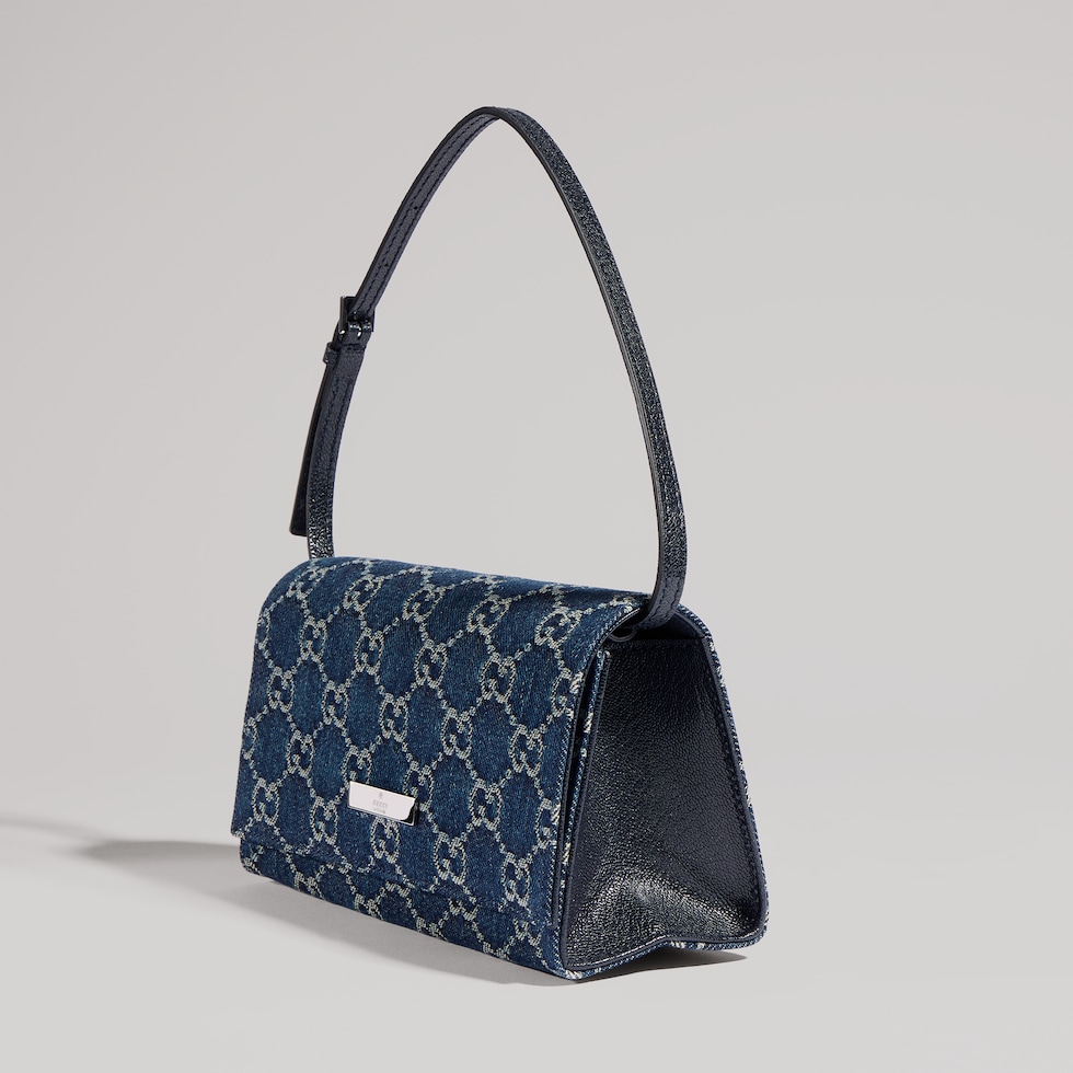 Small pouch with strap and Gucci plaque