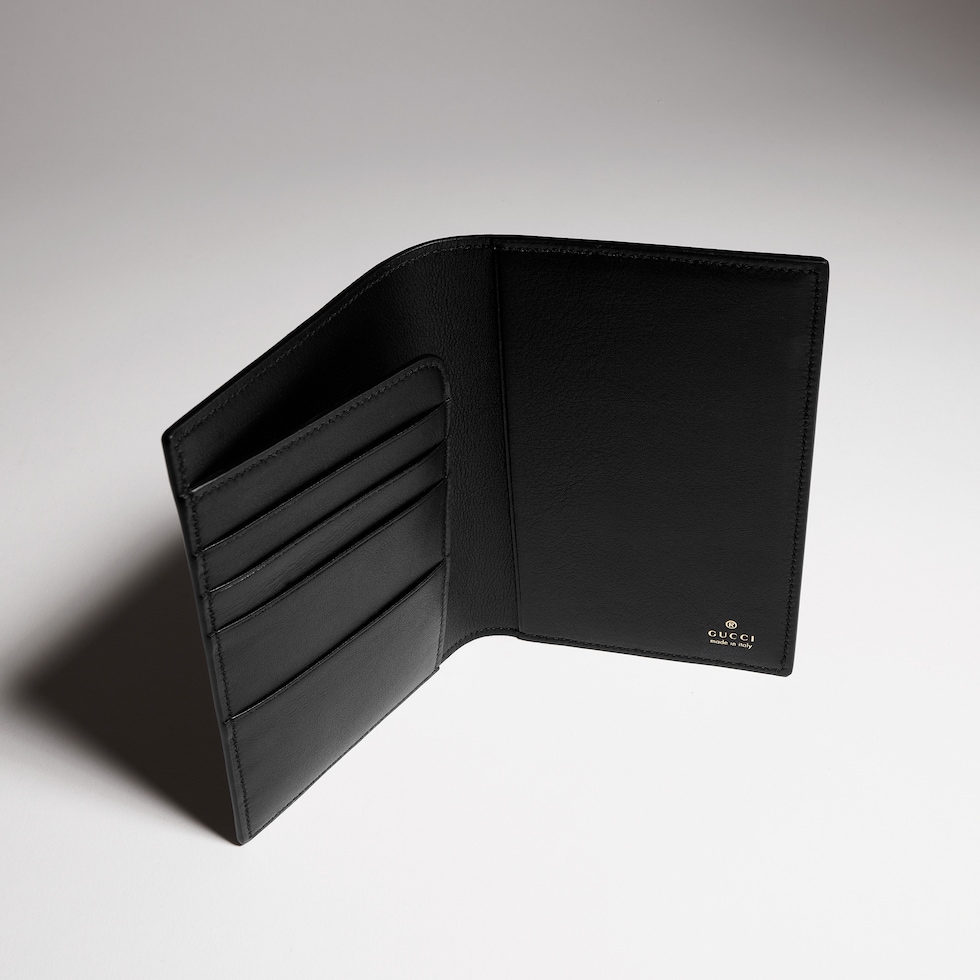 Passport case with gold-foiled logo