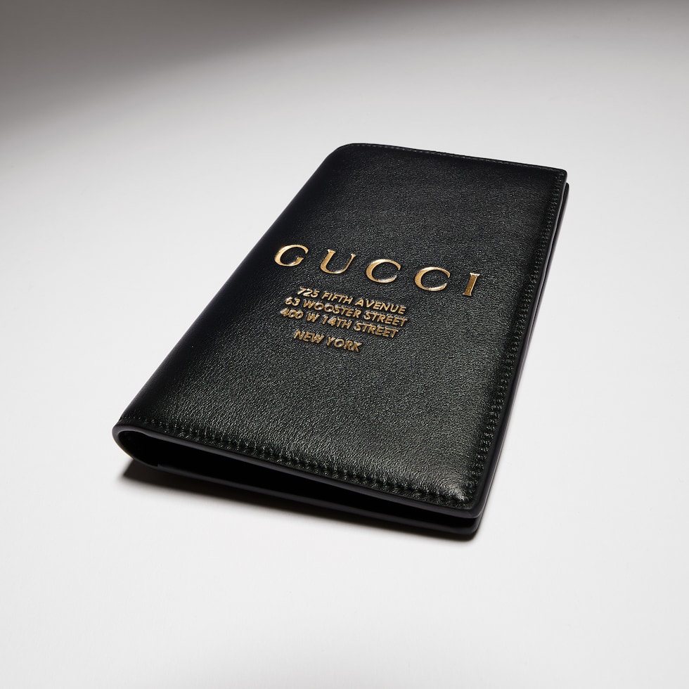 Passport case with gold-foiled logo