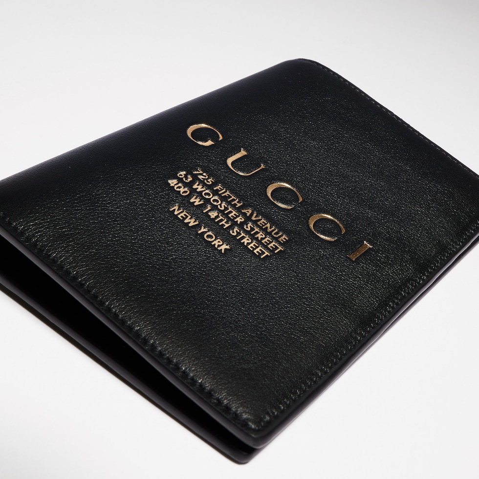 Passport case with gold-foiled logo