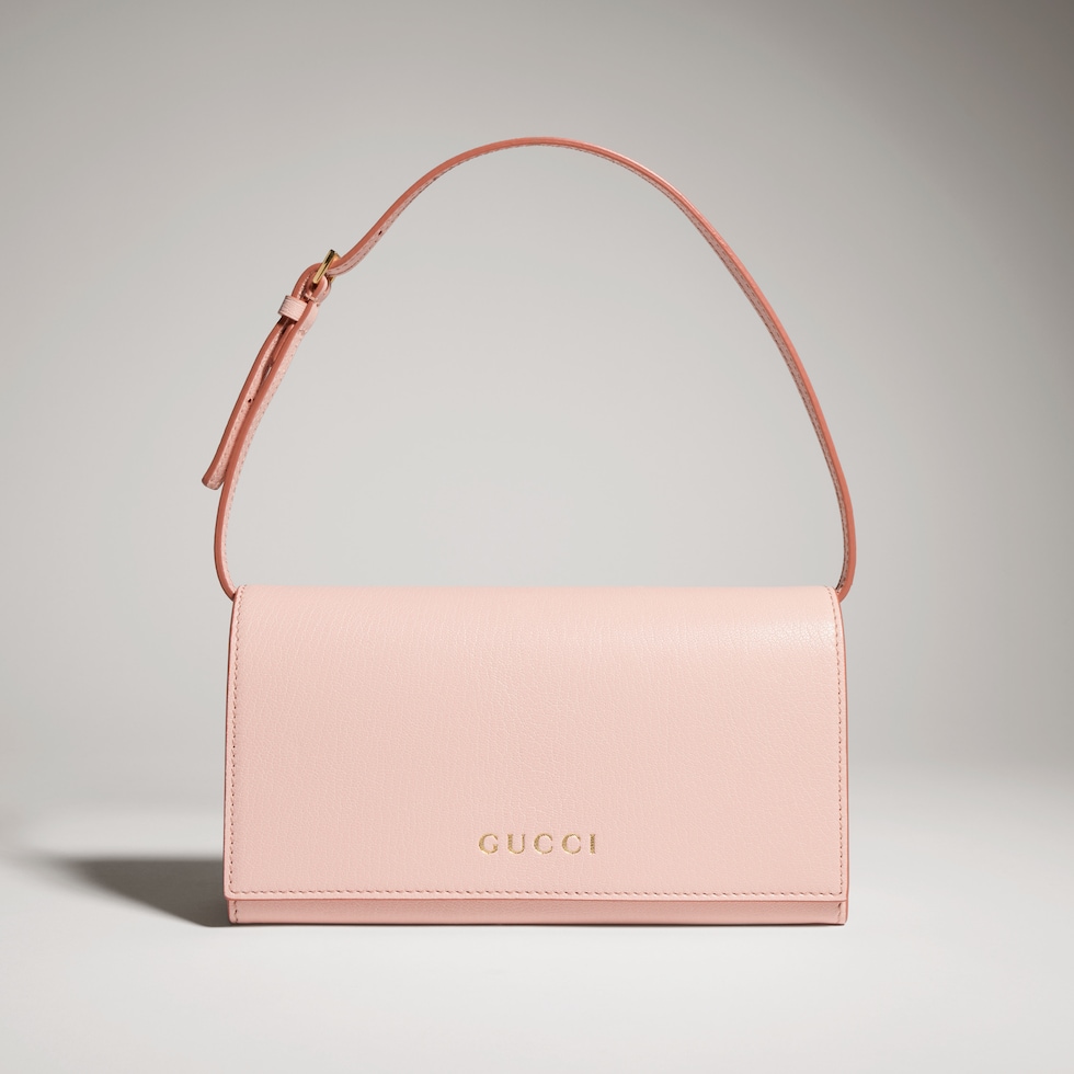 Mini pouch with Gucci lettering