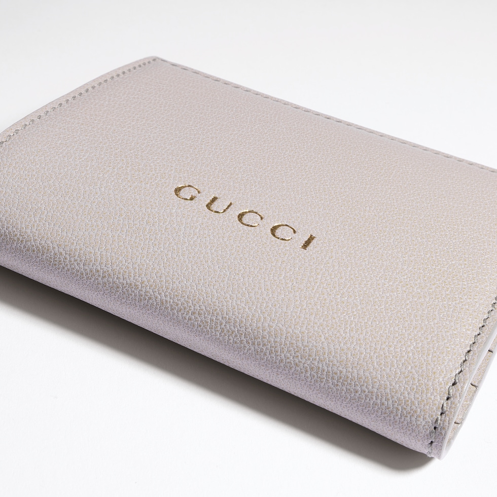 Portefeuille petit format avec lettrage Gucci