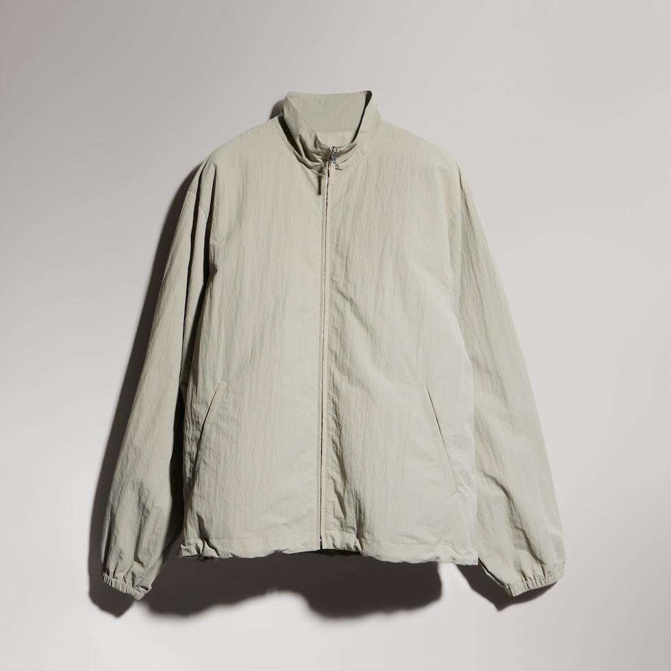 Veste zippée en faille en nylon froissé avec broderie