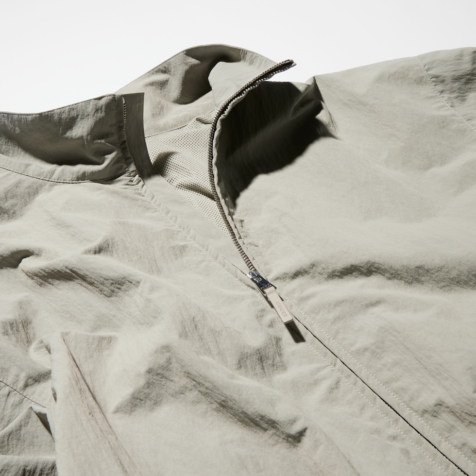 Veste zippée en faille en nylon froissé avec broderie