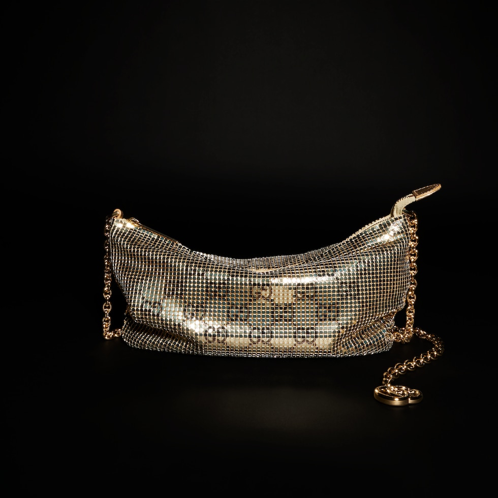 Metallic evening bag with charm
