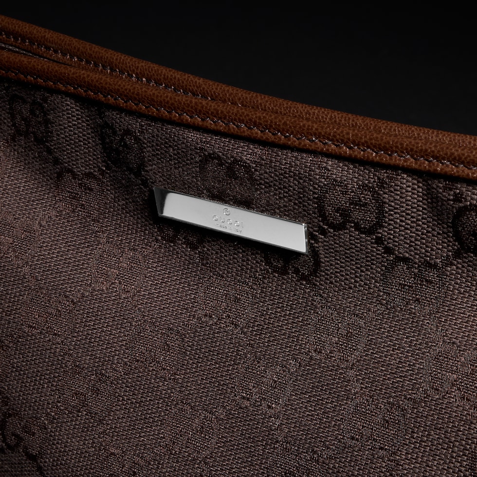 Small pouch with strap and Gucci plaque