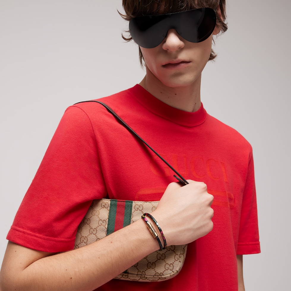 Bracciale doppio in pelle con scritta Gucci
