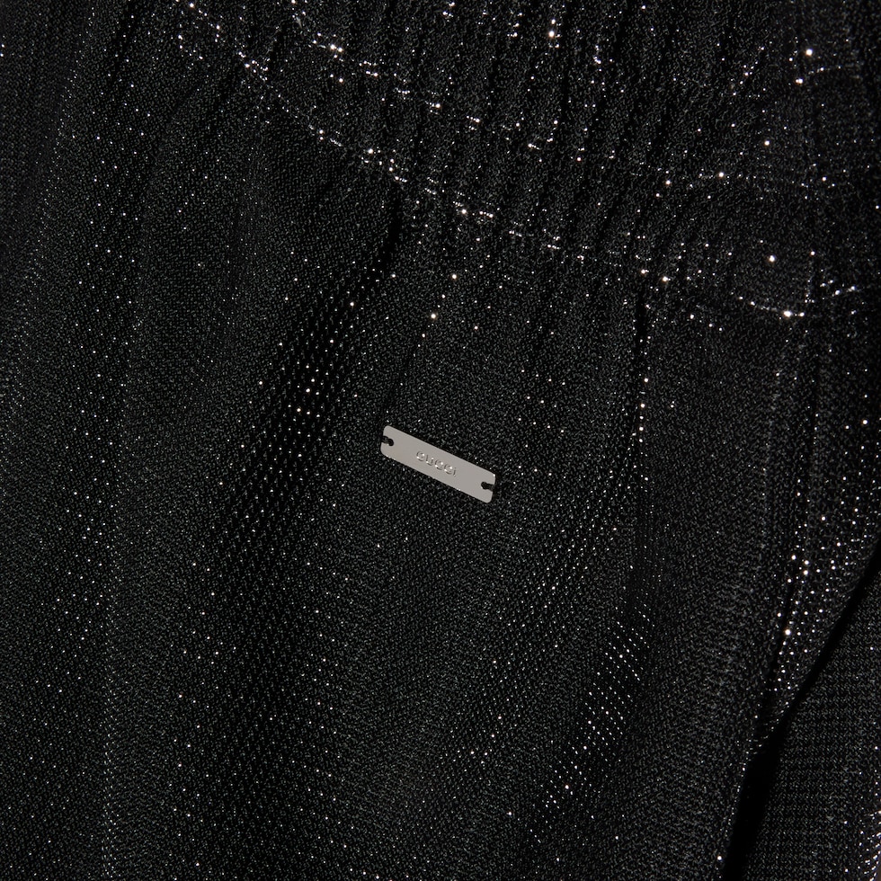 Jersey pants with iridescent effect