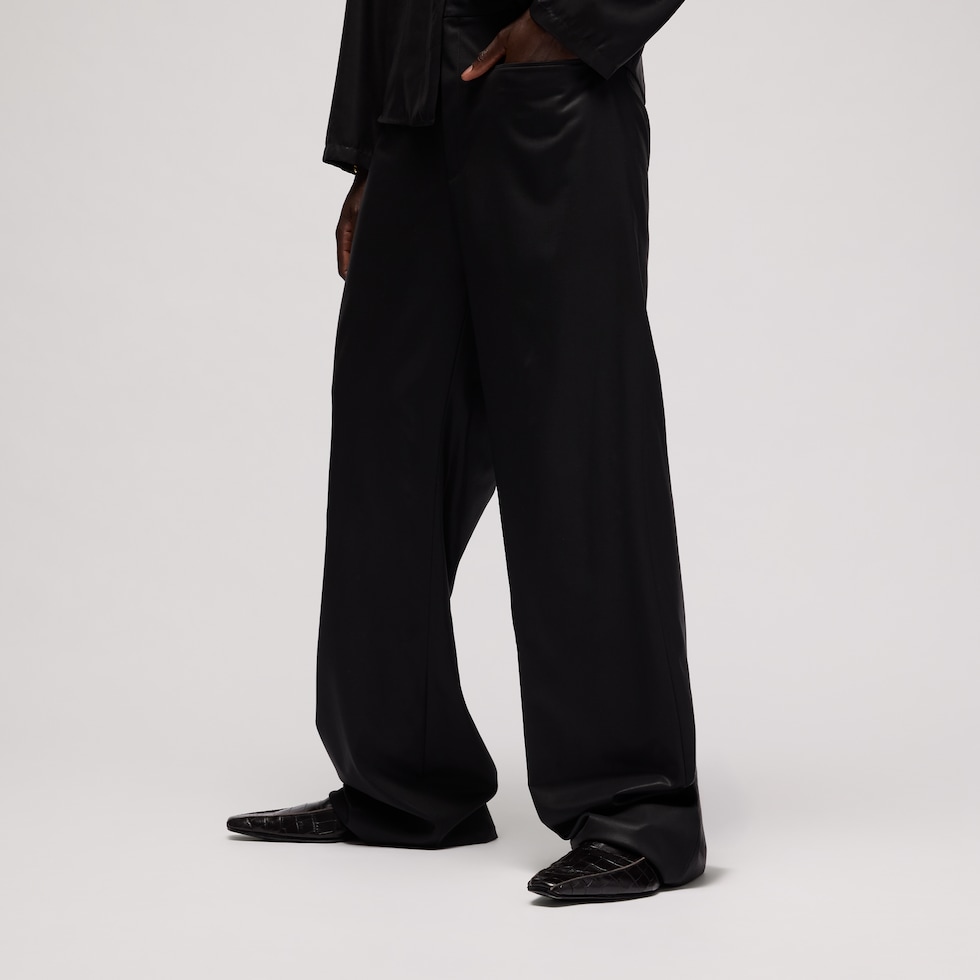 Light wool pants with chintzed finish