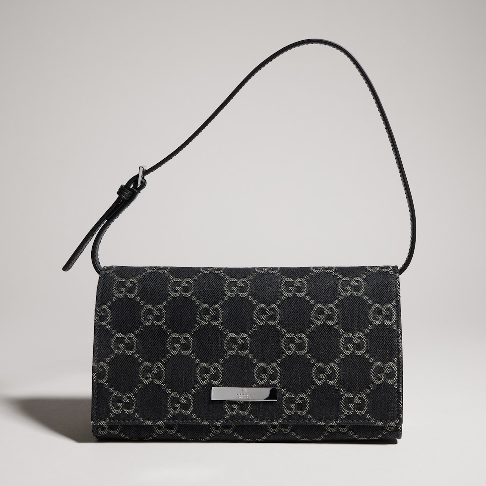 Kleine Pouch mit Riemen und Gucci Plakette