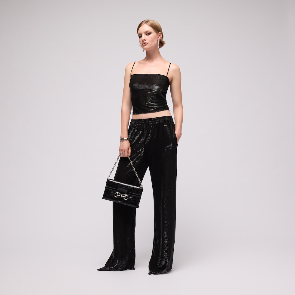 Jersey pants with iridescent effect