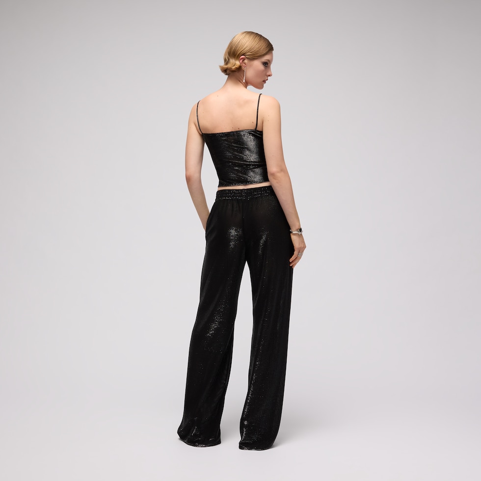 Jersey pants with iridescent effect