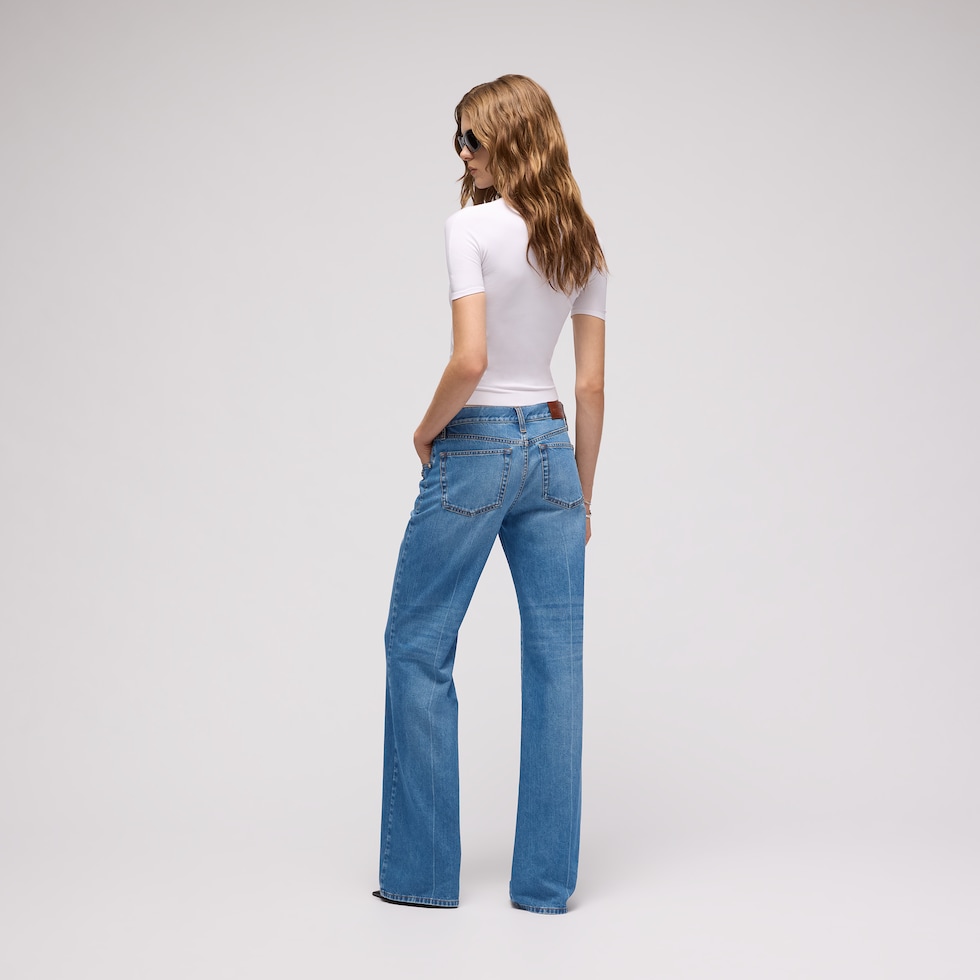 Pantalon bootcut en denim de coton avec Horsebit