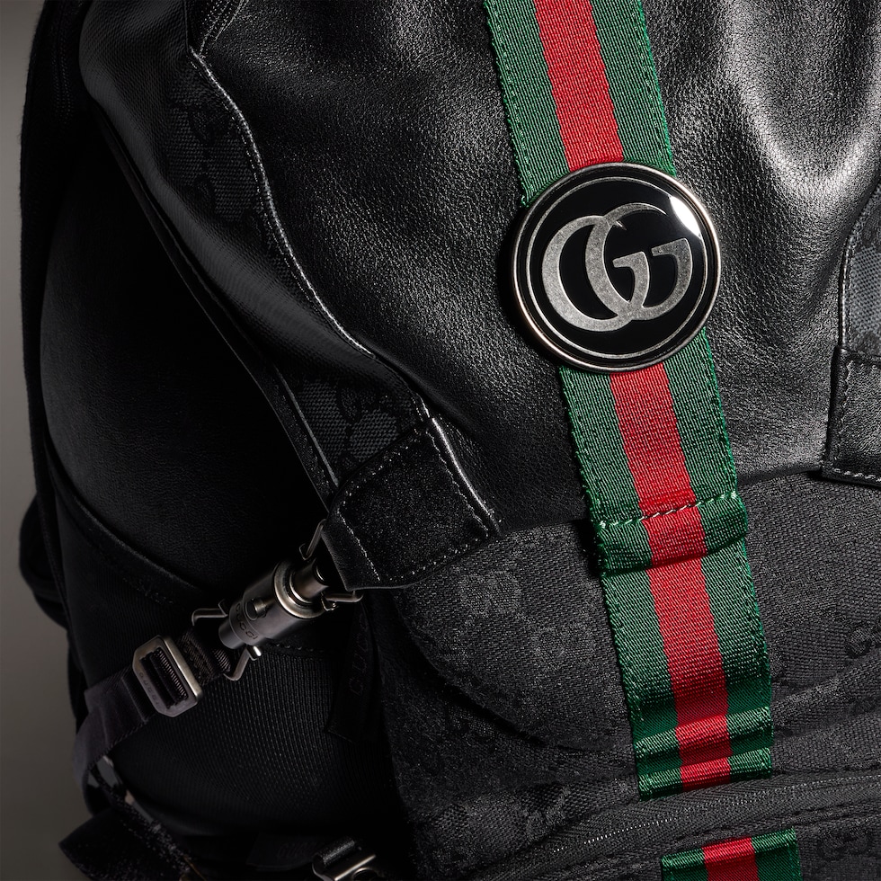 Sac à dos à rabat avec fermeture à piston