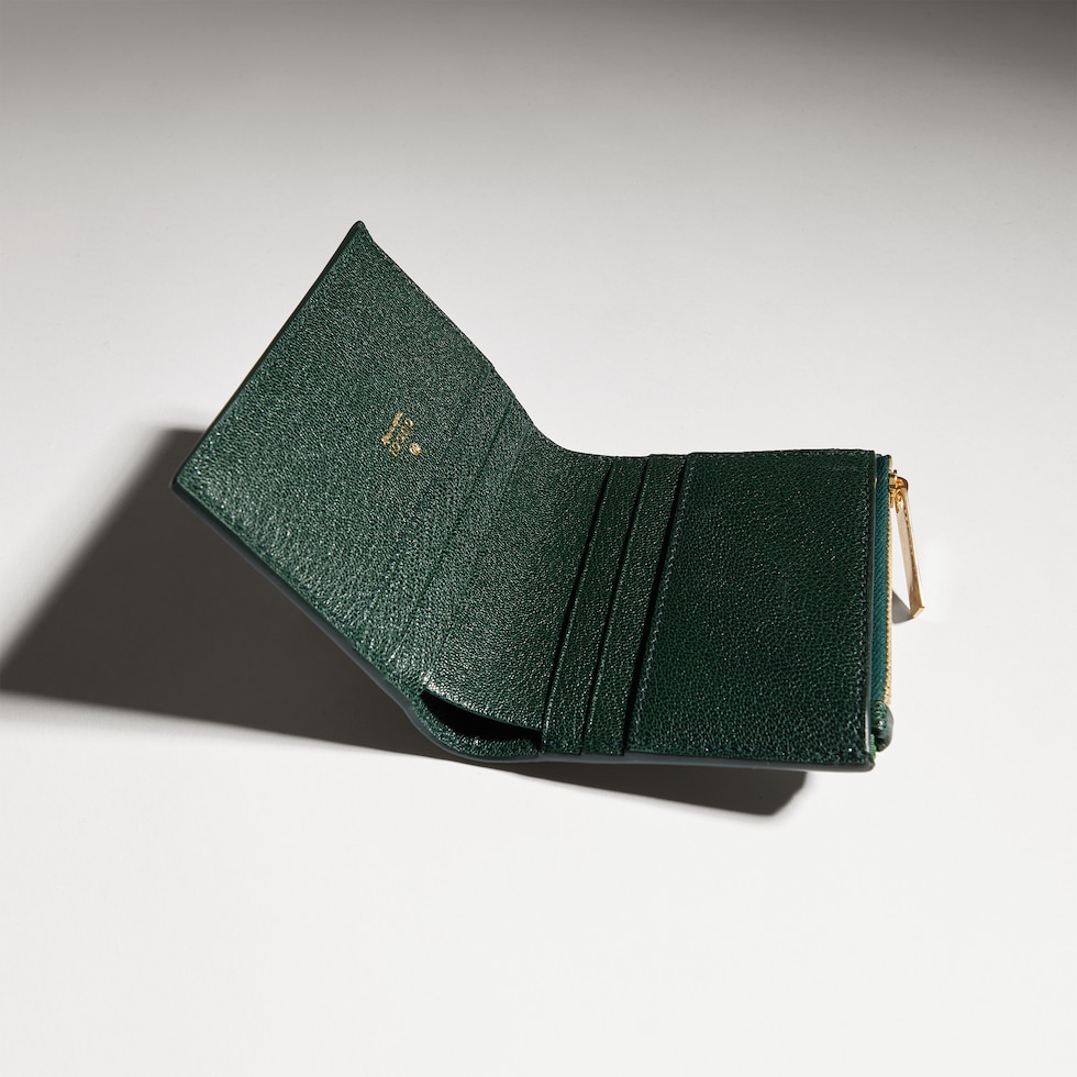 Cartera pequeña con letras Gucci