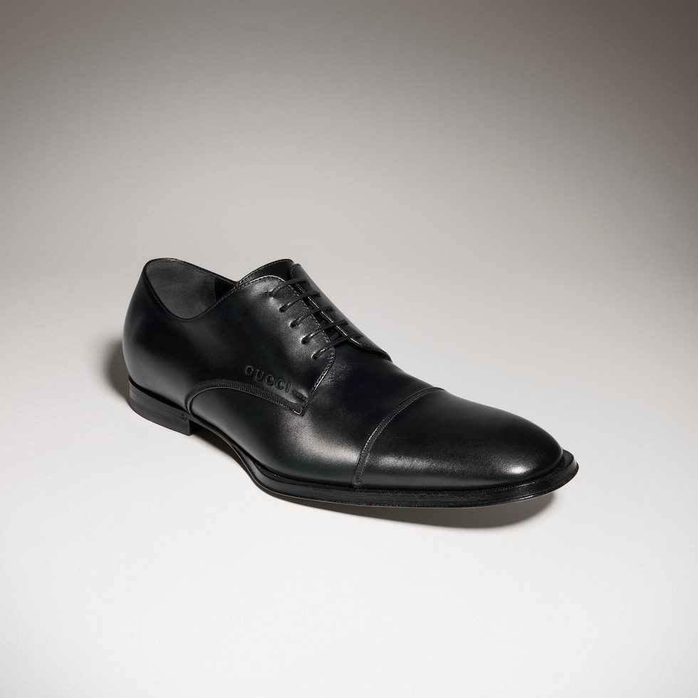 Men's lace-up shoe with embossed logo