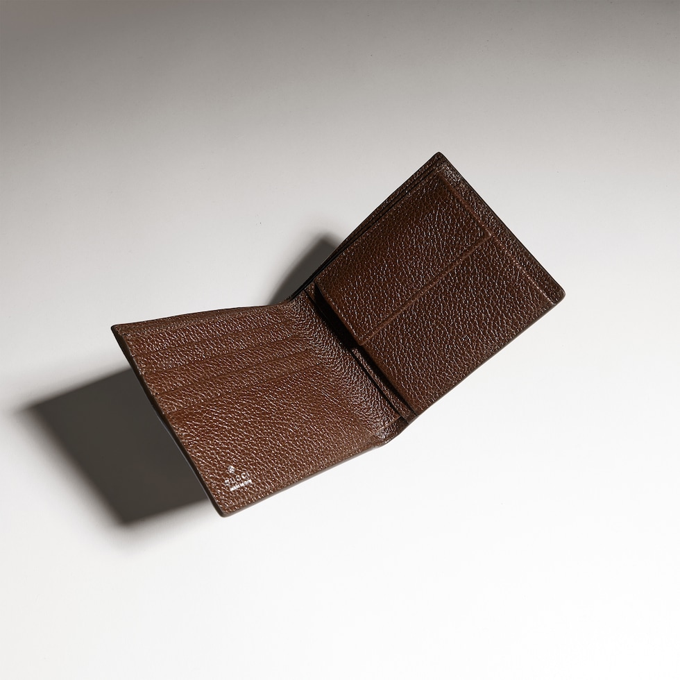 Bi-fold coin wallet with Web