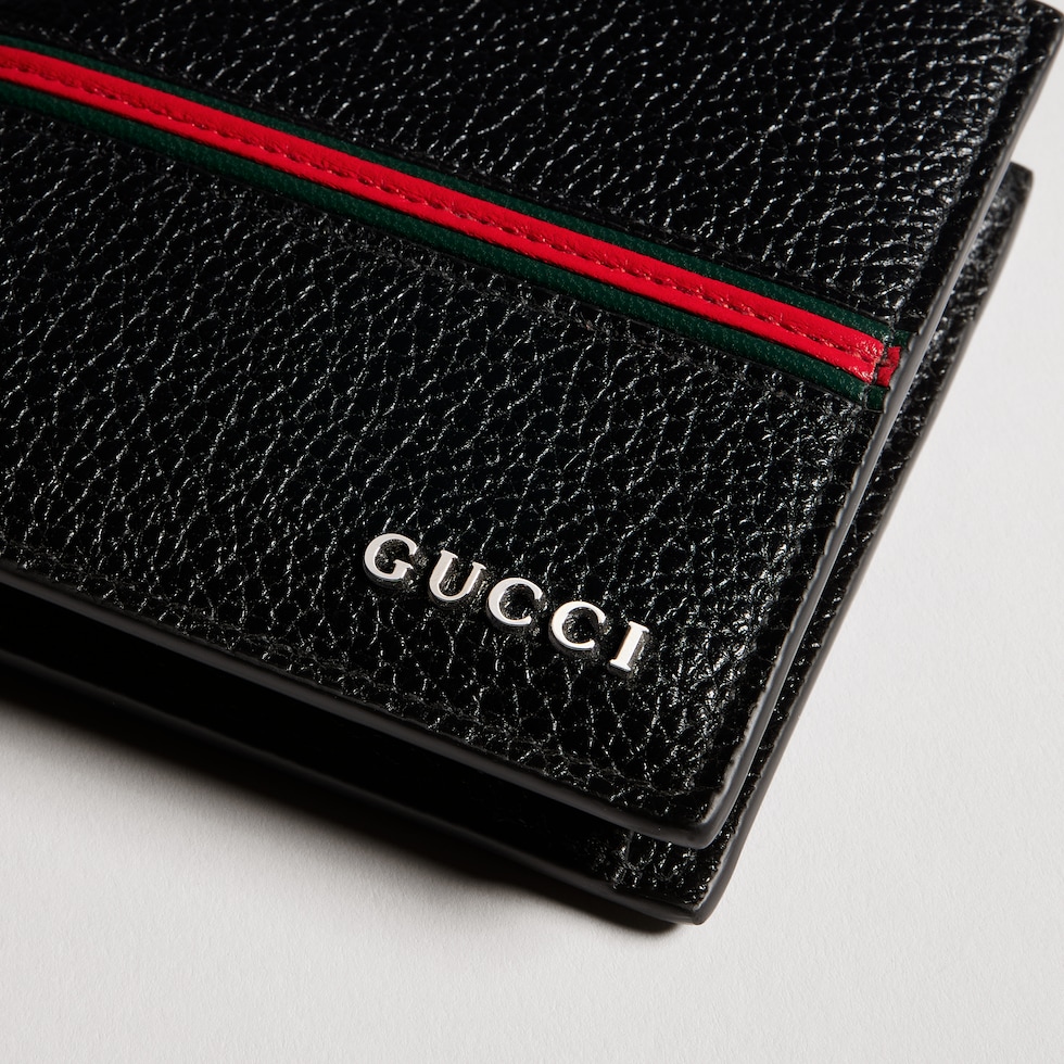 Bi-fold coin wallet with Web