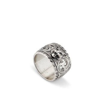 Wide silver ring with feline head
