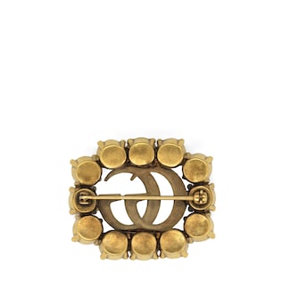 Metal Double G brooch with crystals