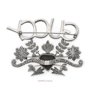 Guccy crystal brooch