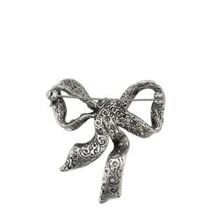 Bow brooch in metal