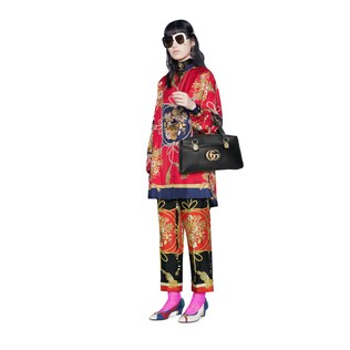 Oversize shirt with flowers and tassels