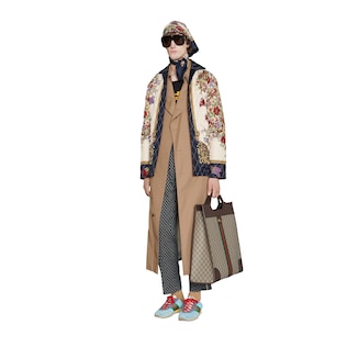 Quilted jacket with flowers and tassels