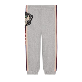 Children's track bottoms with Gucci stripe