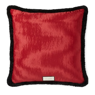 Coussin en velours avec broderie œil et étoiles