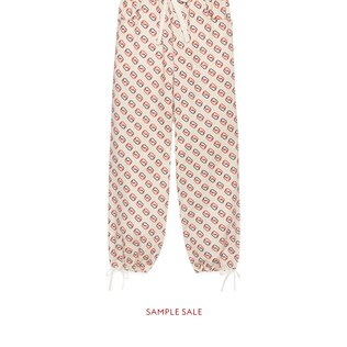 Bi-material track bottoms
