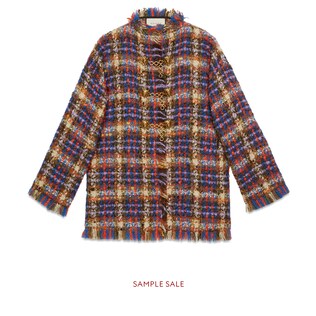 Tweed jacket with lion head toggles