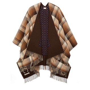 Reversible wool poncho with geometric motif