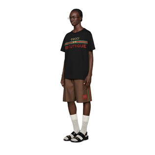 Übergroßes Herren-T-Shirt mit Gucci Boutique-Print