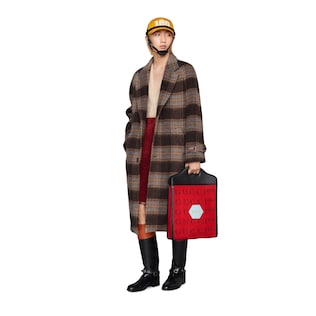 Cappotto in lana a quadri con etichetta Gucci