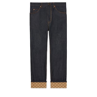Pantalone in denim con risvolti