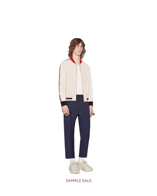Bomberjacke aus perforiertem Leder mit Gucci Logo