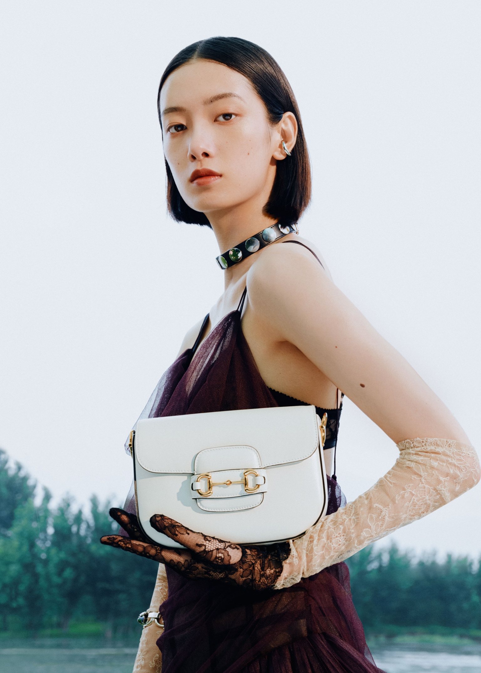 Interpreted as a force of passion, the Gucci Horsebit 1955 is featured