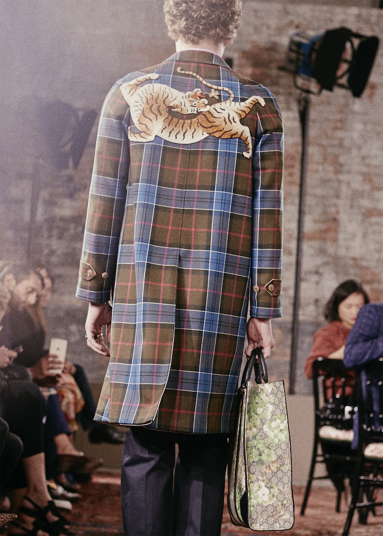 Petals, vines and <strong> whimsical</strong> creatures mingle in the Gucci <strong>menagerie</strong>.Modern Menagerie