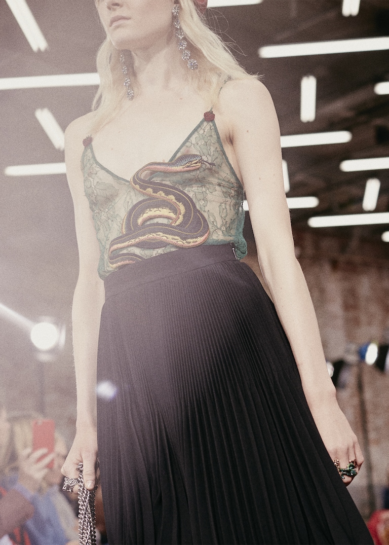 Petals, vines and <strong> whimsical</strong> creatures mingle in the Gucci <strong>menagerie</strong>.Modern Menagerie