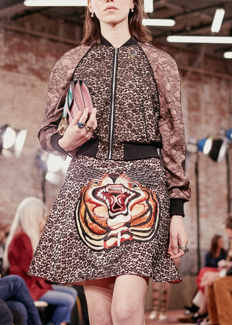 Petals, vines and <strong> whimsical</strong> creatures mingle in the Gucci <strong>menagerie</strong>.Modern Menagerie
