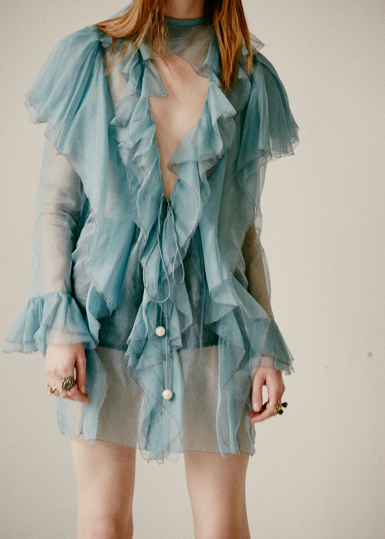 Sweeping <strong>dresses</strong> and the promise of the <strong>unexpected</strong>.Delicate movements