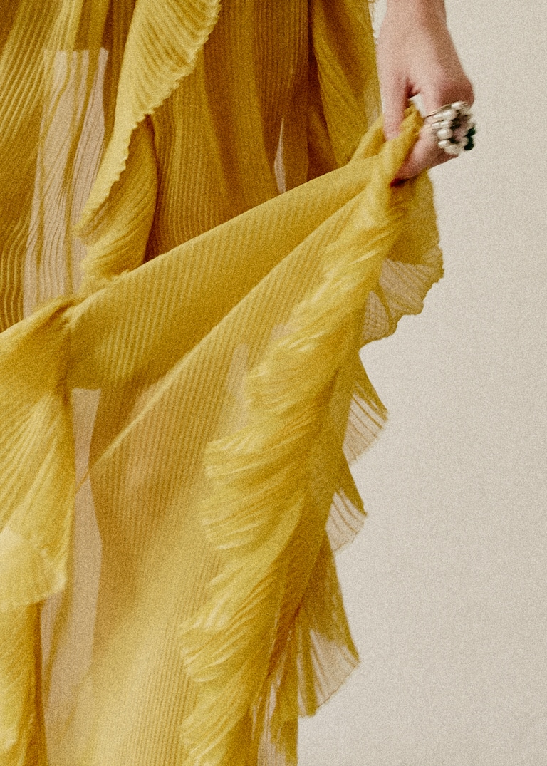 Sweeping <strong>dresses</strong> and the promise of the <strong>unexpected</strong>.Delicate movements