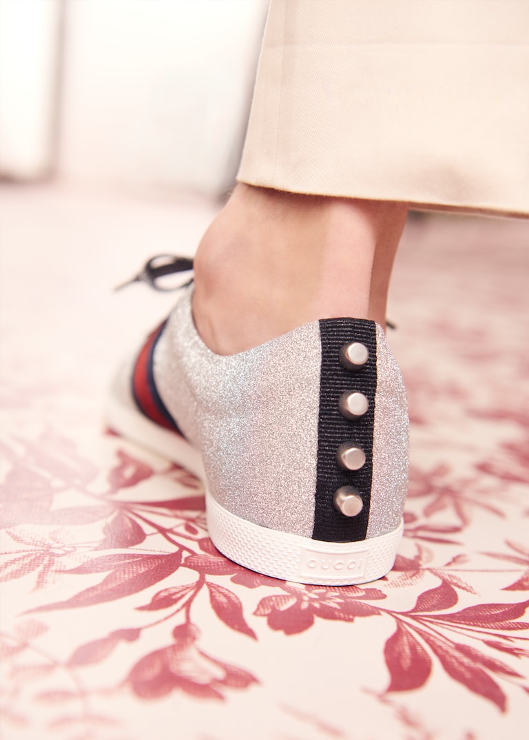 Old-school style <strong>trainers</strong> marked with modern <strong>gleam</strong>.The Web sneaker